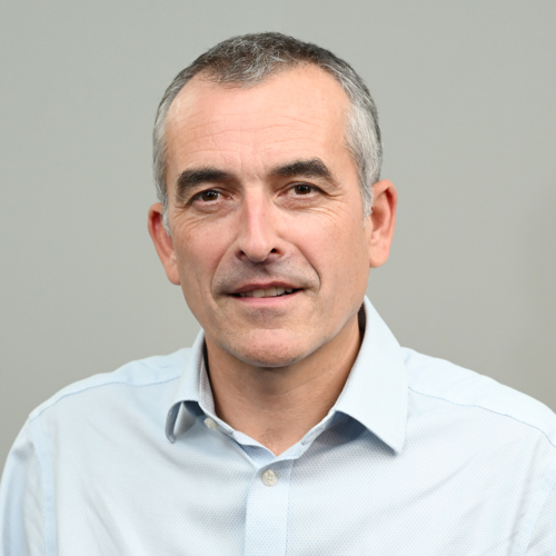A portrait photo of Andrew Denholm