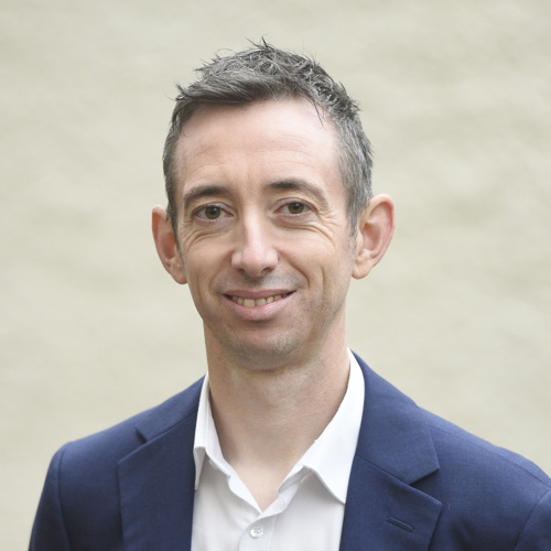 A portrait photo of Douglas White